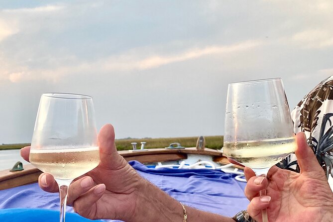 Aperitif at sunset in the Venice lagoon on a private boat. - Arsenale di Venezia stop: shipbuilding walls, industrial scale, and wow factor