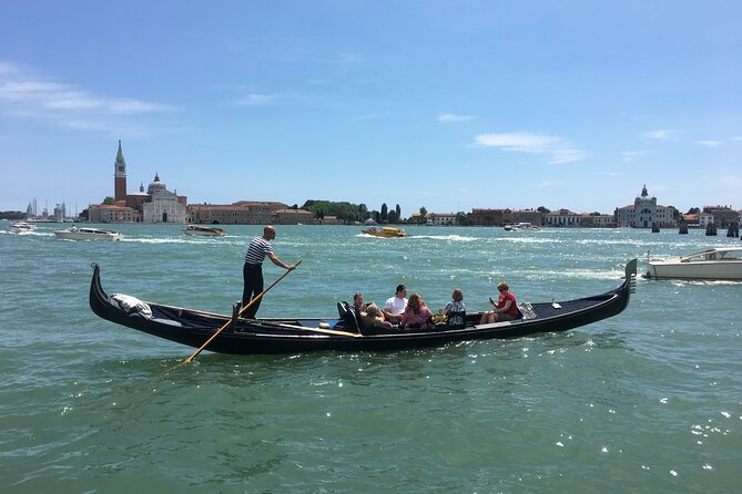 Charming Gondola Ride on the Grand Canal & Gondola Gallery™ - A gondola ride with a built-in Venice primer