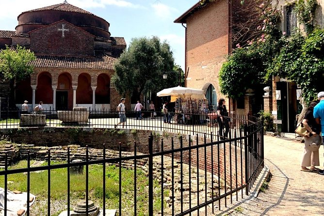 Full-day excursion to Murano, Burano and Torcello from Venice Train Station - Burano stop: colorful streets, leaning tower, and lace if you want it