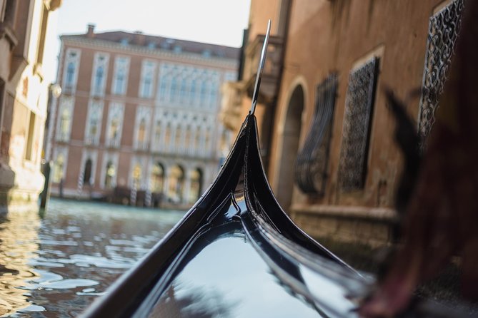 Grand Canal Gondola Experience with Live Commentary™ - Punta della Dogana and San Giorgio Maggiore: Two Views, Two Stories