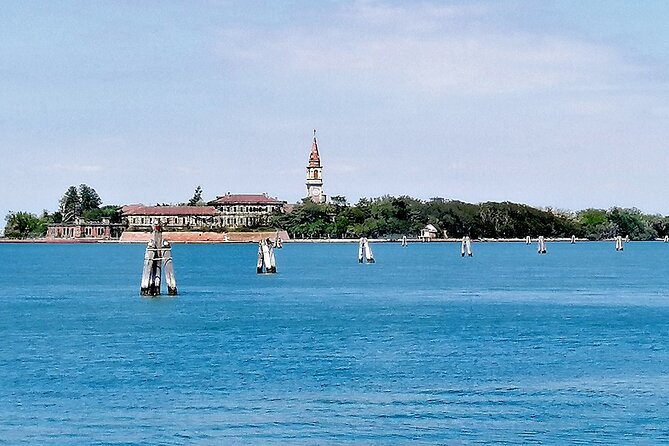Lido Bike Tour: With a Local on the Island of Cinema - Murazzi free beach: the breakwater story you can ride past