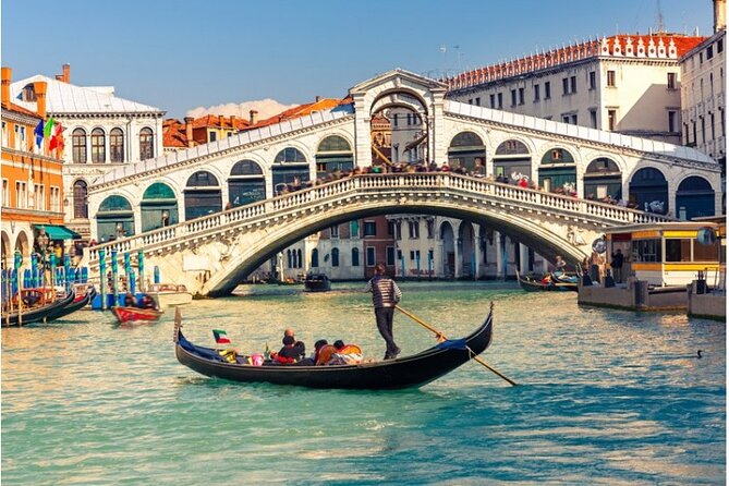 Magical Gondola Journey: Explore Venice's Grand Canal in Style! - Passing the theatre story: Teatro San Benedetto to La Fenice
