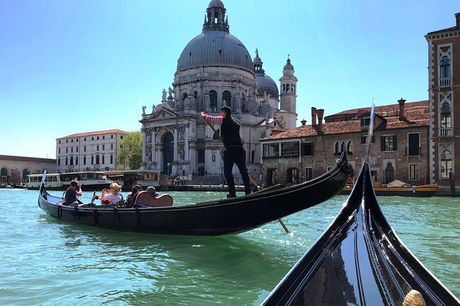 Morning Walking Tour of Venice with Gondola Ride - Canal Grande stop: the main waterway, explained in minutes