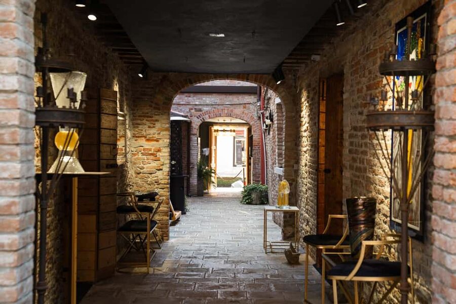 travel through time in Murano with a historic Venetian boat - Scenic Murano views, plus a possible peek at Burano