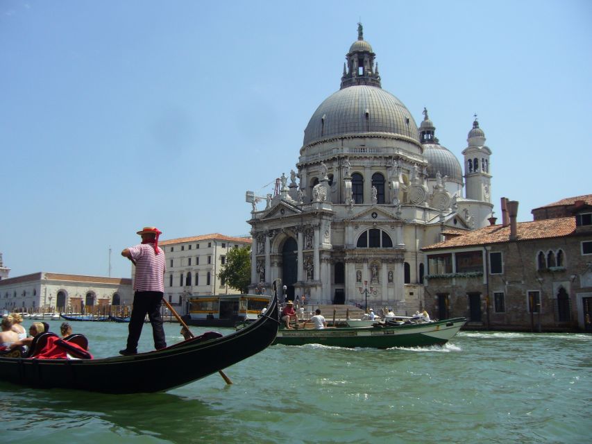 Venice: 30 min Gondola Ride on the Grand Canal with Guide - Palazzo Grassi and the Grand Canal stretch that sells the postcard view