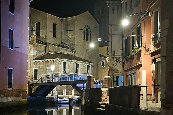 Venice Night Boat Tour from Zattere - Piazza San Marco lit at night: Basilica and Campanile from the water