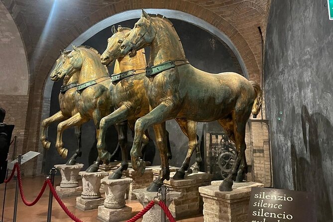Venice Skip the line of San Mark Basilica and Doge's Palace Tour - Doge’s Palace: Gothic Facade, Tintoretto Frescoes, and the Bridge of Sights Story
