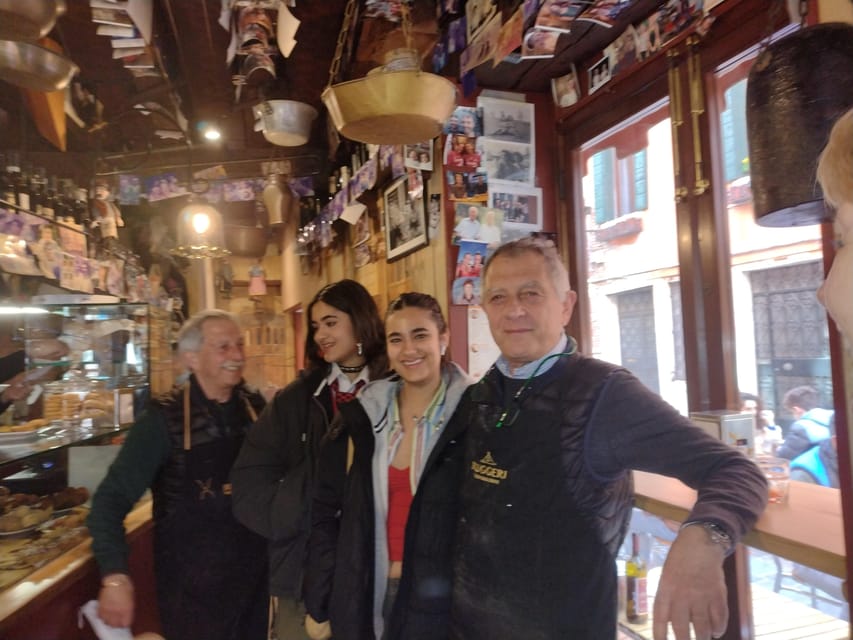 Venice: Sunset Walking Tour with Food and Wine Tastings - Rialto Bridge at sunset, plus a surprising money-history stop