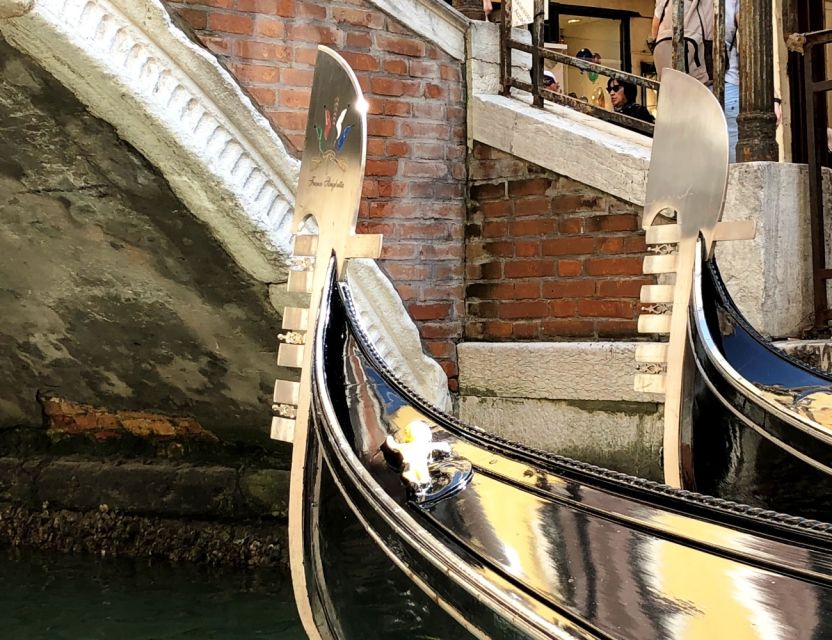 Venice Walking Tour and Gondola Ride Combo - La Fenice Facade and Republic Stories on the Way Back